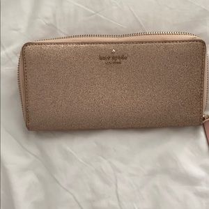 Kate Spade zippered rose gold glitter wallet